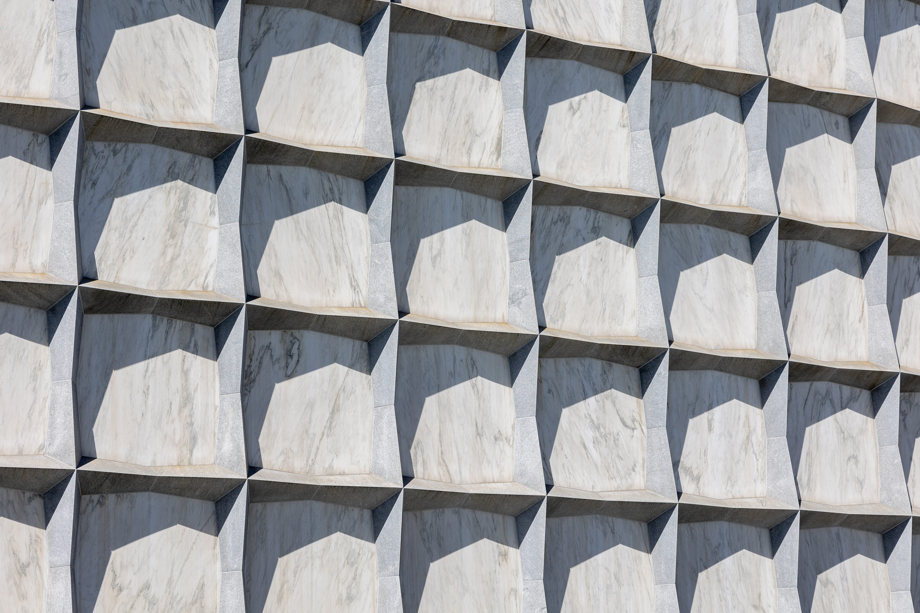 Exterior of the Beinecke Library features powerful stone geometry and marble panes