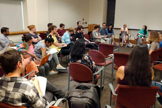Postdocs meet at a YPA Open Forum event to discuss upcoming plans
