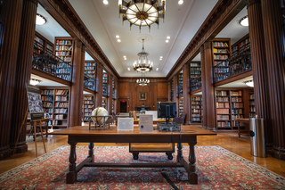 A desk sitting in a library