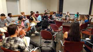 Postdocs meet at a YPA Open Forum event to discuss upcoming plans