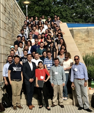 YPA members gathered for a group picture on steps on Yale's campus